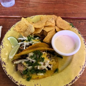 Roosters - Jerk Chicken Tacos with Chips and Queso as sides. - Tacos Near Me - Mobile, Alabama Roosters - Jerk Chicken Tacos with Chips and Queso as sides. - Tacos Near Me - Mobile, Alabama