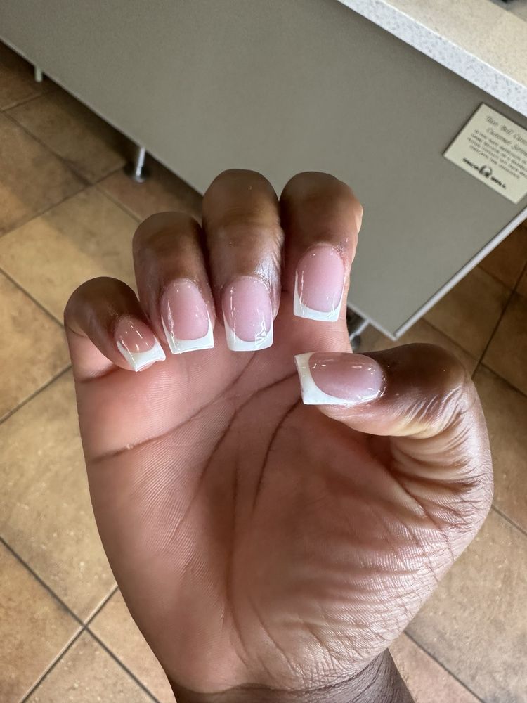 Beyond Nails & Spa Logo