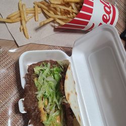Freddy's Frozen Custard & Steakburgers - Smash burger taco and regular fries