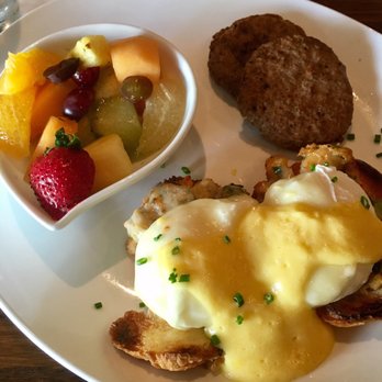 Biscottis - Cajun seafood benedict with side of turkey sausage and fruit - American Near Me - Jacksonville, Florida Biscottis - Cajun seafood benedict with side of turkey sausage and fruit - American Near Me - Jacksonville, Florida