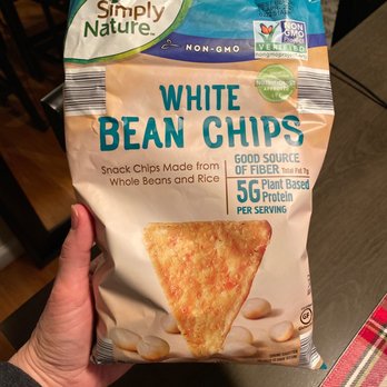 ALDI - a hand holding a bag of white bean chips - Grocery Near Me - Bridgeton, Missouri