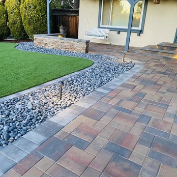 Opulands Landscape Design & Construction - They put in the pavers, stones, sitting wall, artificial grass and steps. We couldn't be happier! - Landscaping Near Me - Campbell, California