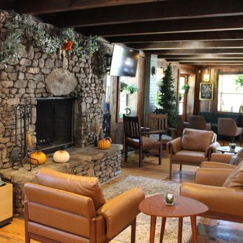 Blue Ridge Adventure Dog - a living room with a stone fireplace - Dog Parks Near Me - Blue Ridge, Georgia Blue Ridge Adventure Dog - a living room with a stone fireplace - Dog Parks Near Me - Blue Ridge, Georgia