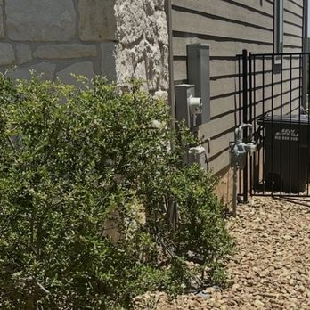 Straight Edge Landscaping - Side of house where we had major erosion issues and provided storage and pavers for our trash bins. - Landscaping Near Me - Leander, Texas Straight Edge Landscaping - Side of house where we had major erosion issues and provided storage and pavers for our trash bins. - Landscaping Near Me - Leander, Texas