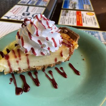 BrewBurgers - Homemade Key lime pie - raspberry drizzle optional - American Near Me - Venice, Florida BrewBurgers - Homemade Key lime pie - raspberry drizzle optional - American Near Me - Venice, Florida