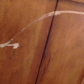 Disaster LINK Restoration Services - Damage to livingroom end table caused by DisasterLink / Pelican - Damage Restoration Near Me - Glendale, Arizona