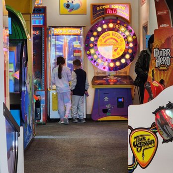 Chuck E. Cheese - people playing a game - Pizza Near Me - San Diego, California