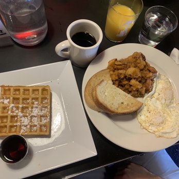 Julians - Waffle on the left and 2 eggs with home fries and toast on the right - New American Near Me - Providence, Rhode Island Julians - Waffle on the left and 2 eggs with home fries and toast on the right - New American Near Me - Providence, Rhode Island