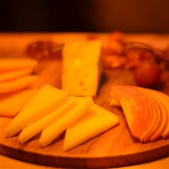 The Social Study - A decadent cheese platter, the perfect compliment to a glass of Chardonnay - Wine Bars Near Me - San Francisco, California The Social Study - A decadent cheese platter, the perfect compliment to a glass of Chardonnay - Wine Bars Near Me - San Francisco, California