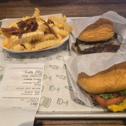 Top left: Bacon Cheese Fries Top right: Black Truffle Burger Bottom right: Single ShackBurger Top left: Bacon Cheese Fries Top right: Black Truffle Burger Bottom right: Single ShackBurger