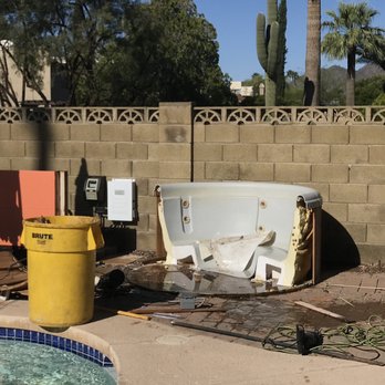 Benshines Junk Removal - After they cut the hot tub in half - Junk Removal & Hauling Near Me