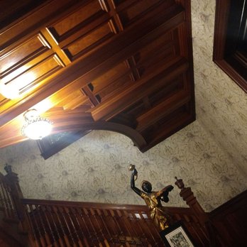Grand Manor Mansion - The woodwork in the entry hall. - Bed & Breakfast Near Me - Galveston, Texas