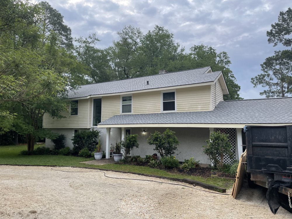 Slide of Ford Roofing