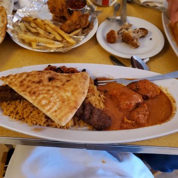 Sameem Afghan Restaurant - Chicken teekah masala and beef kabob with chicken bones in the background. We ate the fried chicken before I had a chance to take a picture. - Afghan Near Me - Saint Louis, Missouri Sameem Afghan Restaurant - Chicken teekah masala and beef kabob with chicken bones in the background. We ate the fried chicken before I had a chance to take a picture. - Afghan Near Me - Saint Louis, Missouri