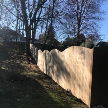 Sanchez Landscaping - a wooden fence in a back yard - Landscaping Near Me - Jamesburg, New Jersey Sanchez Landscaping - a wooden fence in a back yard - Landscaping Near Me - Jamesburg, New Jersey