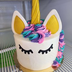 Cupcakesters - A 6 inch round. Unicorn theme cake.