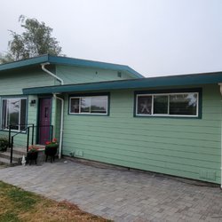 Caselli Custom Painting - After. Great color choice on this corner house