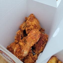 8 piece chicken with side of potato wedges
