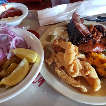 Catfish Louies - Southern happiness =unlimited onion, lemon and sauce for my plate of catfish - Seafood Near Me - Gainesville, Texas