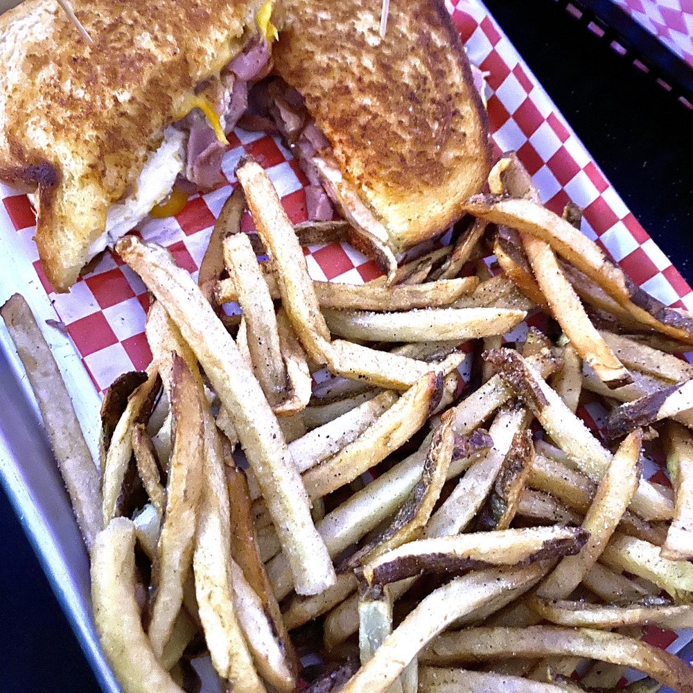 Grilled sourdough breakfast sandwich w/ fries. Good but rich, fresh cut fries good, prefer crispy.