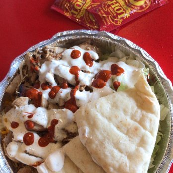 The Halal Guys - Small Chicken Platter, no tomatoes. They aren't lying when they say it's hot sauce. - Halal Near Me - Costa Mesa, California The Halal Guys - Small Chicken Platter, no tomatoes. They aren't lying when they say it's hot sauce. - Halal Near Me - Costa Mesa, California