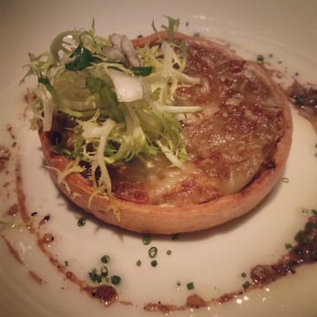 Next - Carmelized onion tart with gruyere aka french onion soup in a tart - New American Near Me - Chicago, Illinois