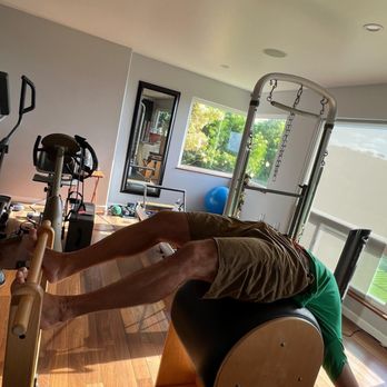 Pilates By Lucy - Stretching and elongating the spine on the ladder barrel - Pilates Near Me Pilates By Lucy - Stretching and elongating the spine on the ladder barrel - Pilates Near Me