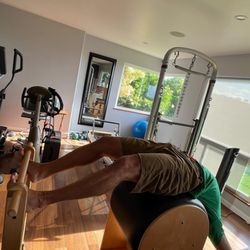 Pilates By Lucy - Stretching and elongating the spine on the ladder barrel