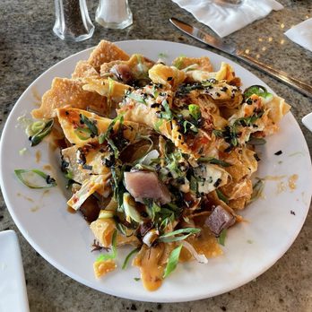 Sunset Kai Lanai - Poke nachos. Not worth $25.95, only had like 6-8 pieces of fish. - Hawaiian Near Me - Kailua-Kona, Hawaii Sunset Kai Lanai - Poke nachos. Not worth $25.95, only had like 6-8 pieces of fish. - Hawaiian Near Me - Kailua-Kona, Hawaii