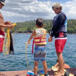 McKenzie's Water Ski School - Jeremiah and Camden talking to our boy