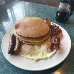 This is the number one. Two sausage two bacon, two egg. With three of there pancakes