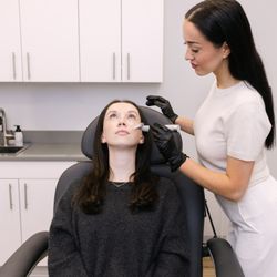 Rejuvn8 - Microneedling treatment. Microneedling treats signs of aging such as texture, fine lines, & wrinkles.