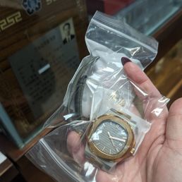 The watch he displaced, for God knows what reason, that he can't even put them back together because he CUT the band. The watch he displaced, for God knows what reason, that he can't even put them back together because he CUT the band.
