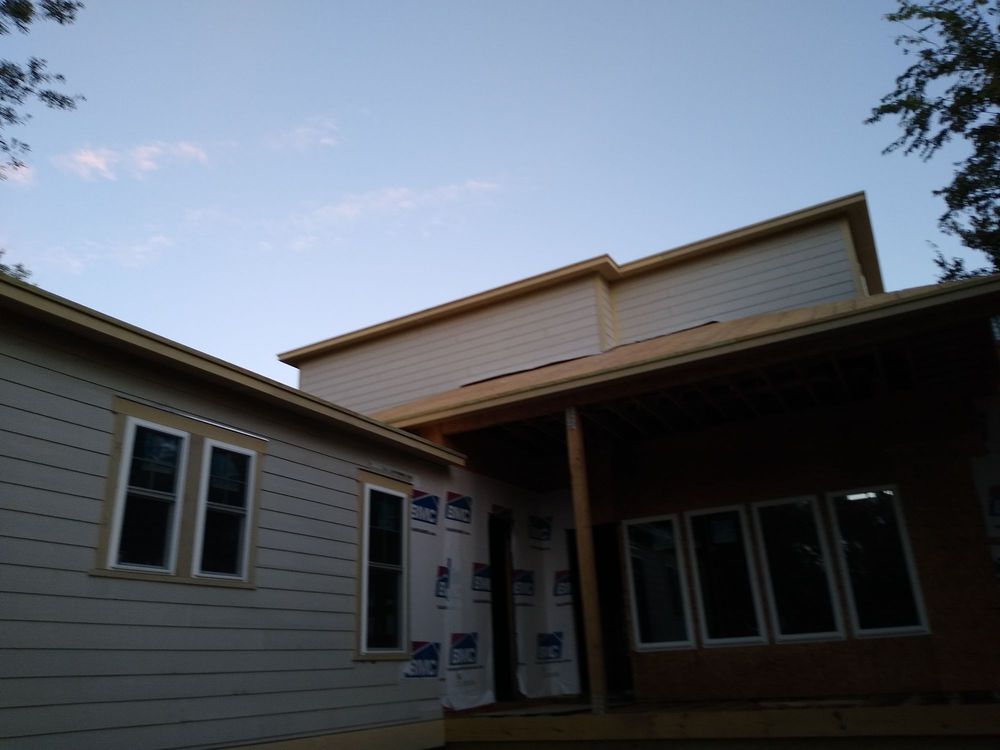 Slide of Lopez Construction and Framing