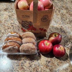 Red lady apples and wine sap apples with cider donuts glazed and original.