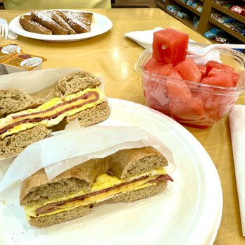 Cascade Cafe - Egg, turkey bacon, and cheese on whole wheat bagel. Watermelon. French toast. - Cafes Near Me - New York, New York