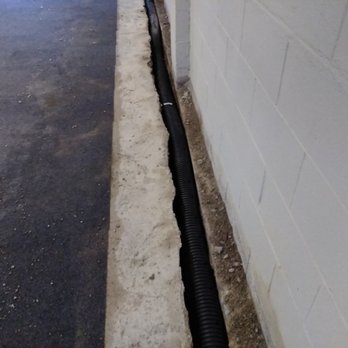 Denny’s Waterproofing - Drain inserted in floor that helps keep the basement dry - Waterproofing Near Me - Greenwood, Indiana Denny’s Waterproofing - Drain inserted in floor that helps keep the basement dry - Waterproofing Near Me - Greenwood, Indiana