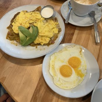 Yolk - Marina City - Chilaquiles and a side of eggs - Breakfast & Brunch Near Me - Chicago, Illinois Yolk - Marina City - Chilaquiles and a side of eggs - Breakfast & Brunch Near Me - Chicago, Illinois
