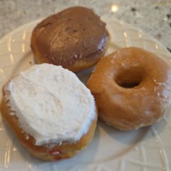 Clockwise from the top: custard, glazed, raspberry.