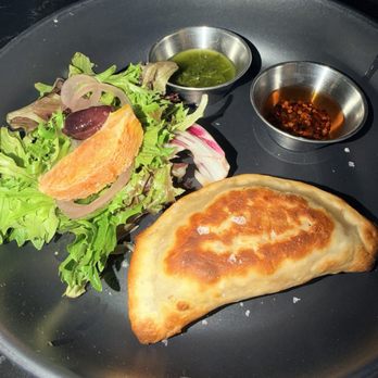 VINIA Wine & Kitchen - Beef and Cheese Empanada - Wine Bars Near Me - Winter Park, Florida VINIA Wine & Kitchen - Beef and Cheese Empanada - Wine Bars Near Me - Winter Park, Florida