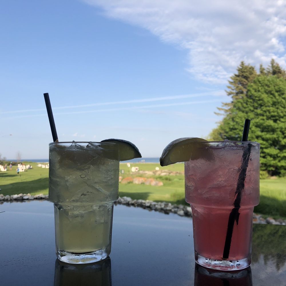 two cocktails on a table