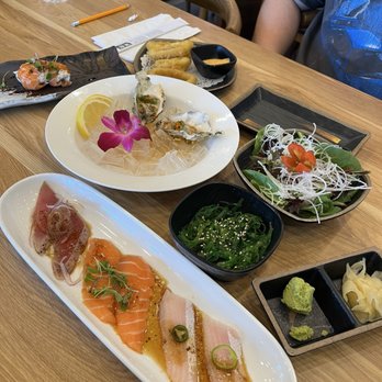 Kairi Sushi - Seared tuna, salmon and yellowtail carpaccio, oysters, seaweed salad, house salad, fried calamari, and dragon fire roll - Sushi Bars Near Me - Cerritos, California Kairi Sushi - Seared tuna, salmon and yellowtail carpaccio, oysters, seaweed salad, house salad, fried calamari, and dragon fire roll - Sushi Bars Near Me - Cerritos, California