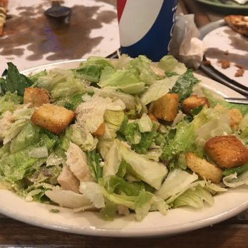 Harris Pizza #5 - This is supposed to be a Caesar salad with chicken.  It is warm and slimy.  Not much chicken on it and the dressing is not a Caesar dressing - Pizza Near Me - Bettendorf, Iowa