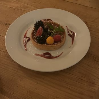 Osteria Laguna - Lemon Tart with berries - Italian Near Me - New York, New York Osteria Laguna - Lemon Tart with berries - Italian Near Me - New York, New York