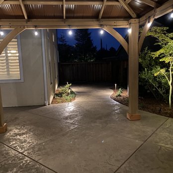 New Look Landscape - Backyard evening shows lights - Landscaping Near Me - Farifield, California