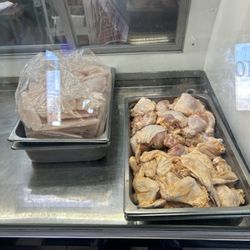 Captain Jay's Fish & Chicken - Chicken and fish in the cooler.