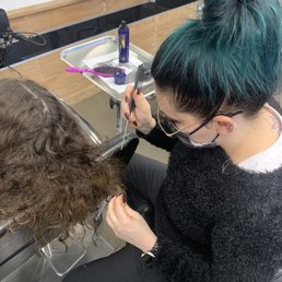 Brandy detangling frizzed hair!