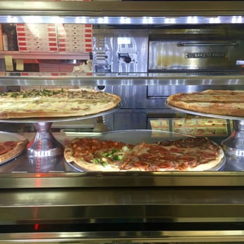 Delicias Pizza & Fried Chicken - Display of various pizzas - Mexican Near Me - Flushing, New York Delicias Pizza & Fried Chicken - Display of various pizzas - Mexican Near Me - Flushing, New York