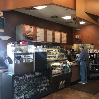 Dunn Brothers Coffee - a man and a woman in a coffee shop - Coffee & Tea Near Me - Alexandria, Minnesota Dunn Brothers Coffee - a man and a woman in a coffee shop - Coffee & Tea Near Me - Alexandria, Minnesota