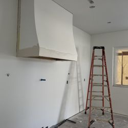 CA Drywall - Kitchen hood made out of wood and drywall with a level 5 finish
